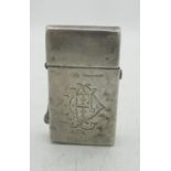 Marked sterling silver lighter with engraved initials