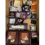 Large collection of costume jewellery including brooches, necklaces bracelets and a wooden jewellery