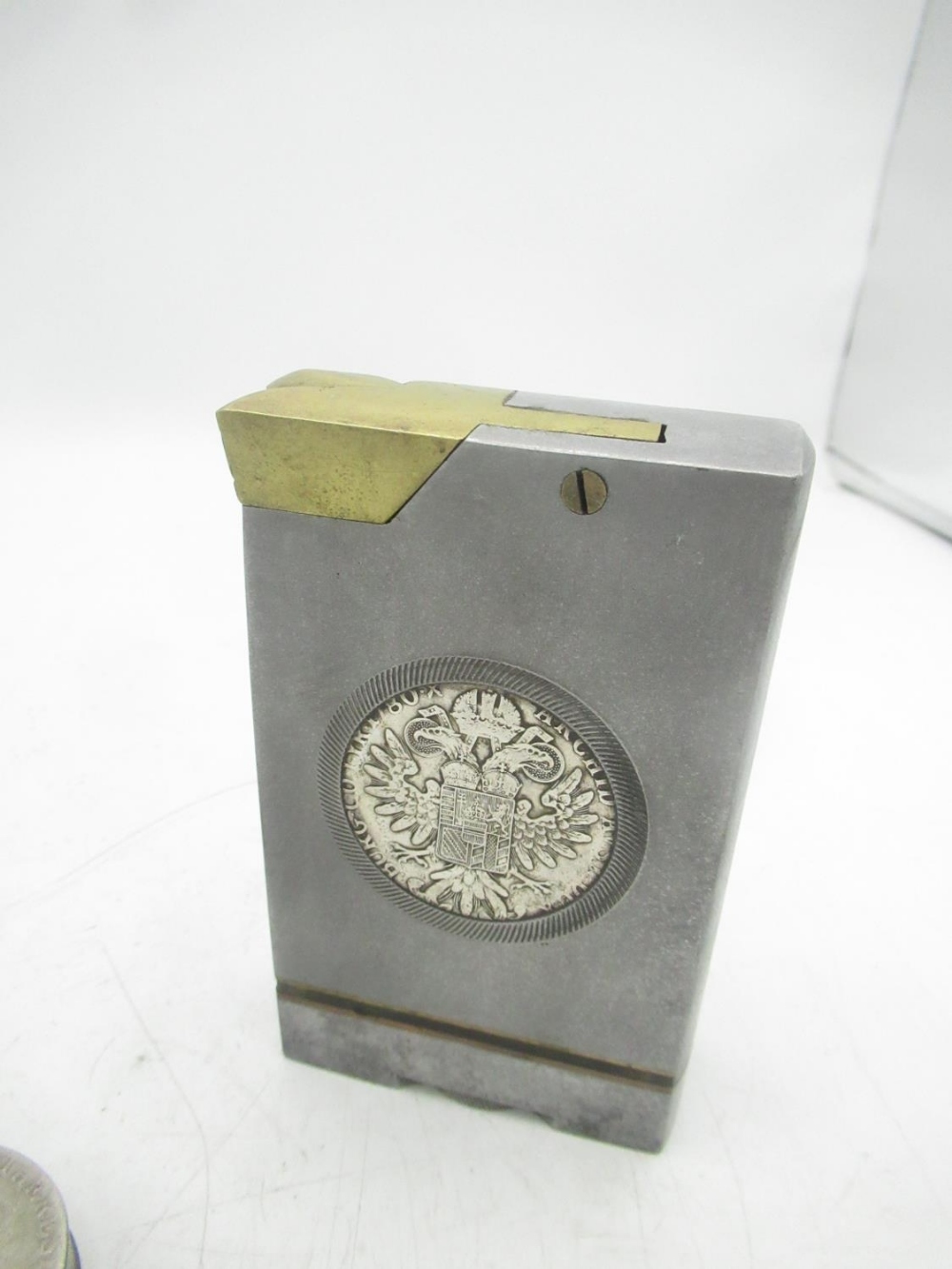 Large metal lighter with Maria Theresa coin encased and a circular Maria Theresa coin lighter (2) - Image 2 of 8