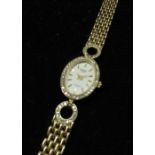 Ladies Rotary gold cased quartz wristwatch, white dial with applied gold baton hour markers, oval