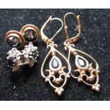 Pair of 9ct yellow gold mounted garnet studs, a pair of 9ct yellow gold drop earrings with central
