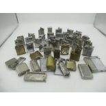Large collection of early 20th century lighters inc. Parker Beacon, The Roller Beacon, Diamond,