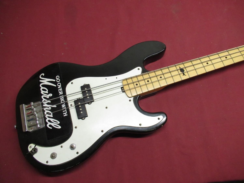 Marlin Slammer bass guitar in black and white finish, missing one string, tone dials and damage