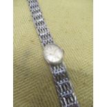 1930's ladies cocktail watch in chrome plated case with faceted blue glass shoulders, with
