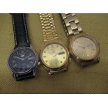 Seiko 5 Sports automatic wristwatch with day date, gold plated case on matching gold plated