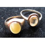 Hallmarked 9ct yellow gold signet ring with a cabochon smoky hardstone, size F and a hallmarked