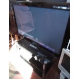 Samsung DVB digital TNT HD P Plasma television, model PS42845081w with remote control on three-