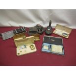 Japanese design ash tray, lighthouse ashtray, 5 lighter and cigarette case sets and a partial