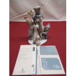 Lladro figure group of a Snowman and two children, with certificate
