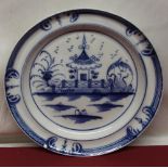 Early C19th English circular plate, painted with Chinese Pagoda in a garden, D23cm (A/F)
