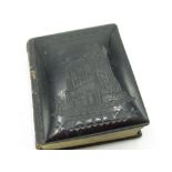 Whitby jet engraving of Whitby Abbey covered Psalms book