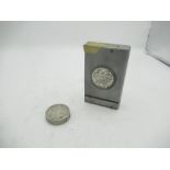 Large metal lighter with Maria Theresa coin encased and a circular Maria Theresa coin lighter (2)
