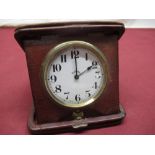 Doxa early C20th red leather cased travel clock, folding case, white enamel dial with Arabic