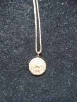 9ct yellow gold St Christopher pendant on a 9ct yellow gold snake chain necklace, 6.9g