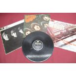 The Beatles Please Please Me LP, A Hard Days Night LP (missing inner and outer sleeve), the