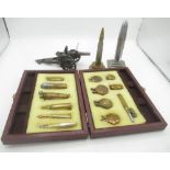 Cased set of 13 Trench Art lighters, American table lighter designed as an Artillery piece and 2