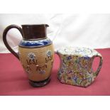 Royal Doulton jug, brown and blue glaze, central ribbed section set with flowers, impressed makers