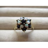 Hallmarked 9ct yellow gold opal and sapphire cluster ring, Birmingham, 1976, size O, 2.9g