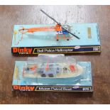 Dinky Bell police helicopter on original mount and a Dinky motorpatrol boat 675 on its original