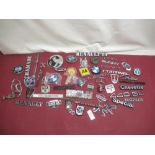 Collection of car badges and labels for Mercedes, BMW, Rover, Ford, etc