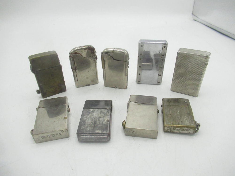 Collection of 8 early 20th century lighters, a Panther of London lighter and a Maruman lighter(10)