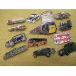 Selection of various picture type enamel pin badges, mainly trucks, cars and trains