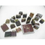 Collection of early 20th century lighters, with leather covering to the majority (21)