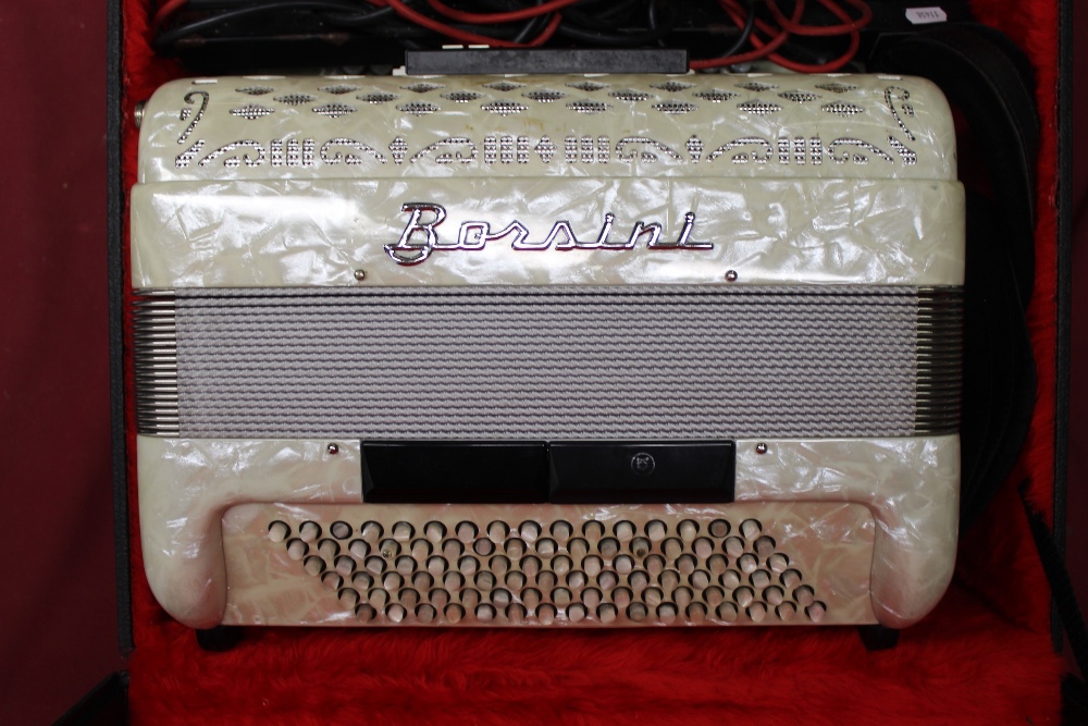 Early 1970's Borsini piano accordion in cream marbleised acrylic case, simulated black and white - Image 2 of 2