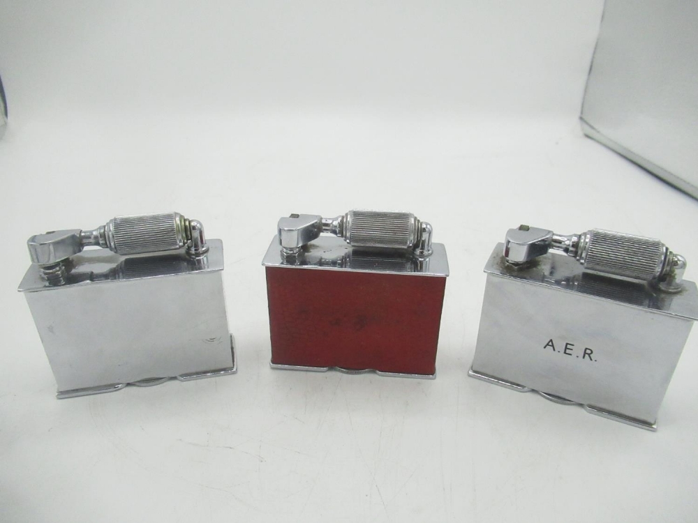 Three McMurdo table lighters