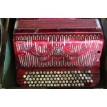 C20th Ca Scandalli Italia, piano accordian, in marbleised red case with mother of pearl button