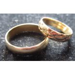 Hallmarked 9ct yellow gold wedding band, size W, and a hallmarked 9ct yellow gold wedding band all