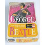 Owain Wyn Evans Collection - Vintage 1964 unbuilt plastic model kit of Beatles star George Harrison,