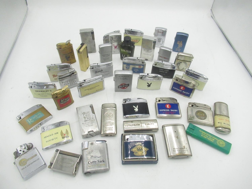 Collection of lighters with various business advertisement inc. Baste & Lange Ship Stores, Arnold