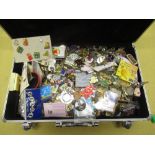 Aluminium flight case containing a large collection of lapel pins & button badges incl. political,