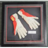 WITHDRAWN - Framed and signed pair of racing drivers gloves, commemorating Ferrari's 1999