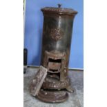 Godin cast iron stove, cylindrical body on three feet, H90cm