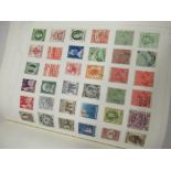 Green Barclay classic Stamp Album containing Will stamps from, Aiden Basutoland British Guiana and