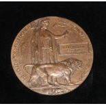WWI bronze memorial plaque (death penny) for John William Cotton, WWI Casualty victory medal awarded