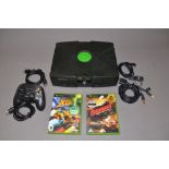 Original XBox with controller, power cord and AV cables. Tested, turns on, green light flashes but