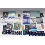 Selection of collectable 50p coins, majority UNC and sealed in original packaging. Includes