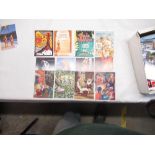 Box containing a collection of postcards of various subjects including Chanel, DKNY sunglasses,