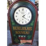 Beaujolais Nouveau painted wooden wall clock with white Arabic dial, H91cm