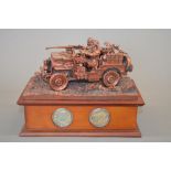 Danbury Mint "Desert Raiders", painted resin sculpture with a contemporary and modern coin, with