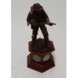 Danbury Mint "The Liberator", painted resin sculpture of a British, with five period coins and a