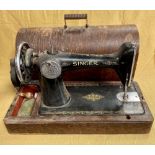 Vintage Singer hand sewing machine, No.EA.184197, in oak case