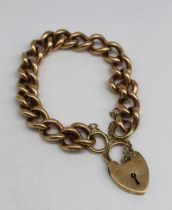 9ct yellow gold curb link bracelet with heart padlock clasp, stamped 375, 53.7g