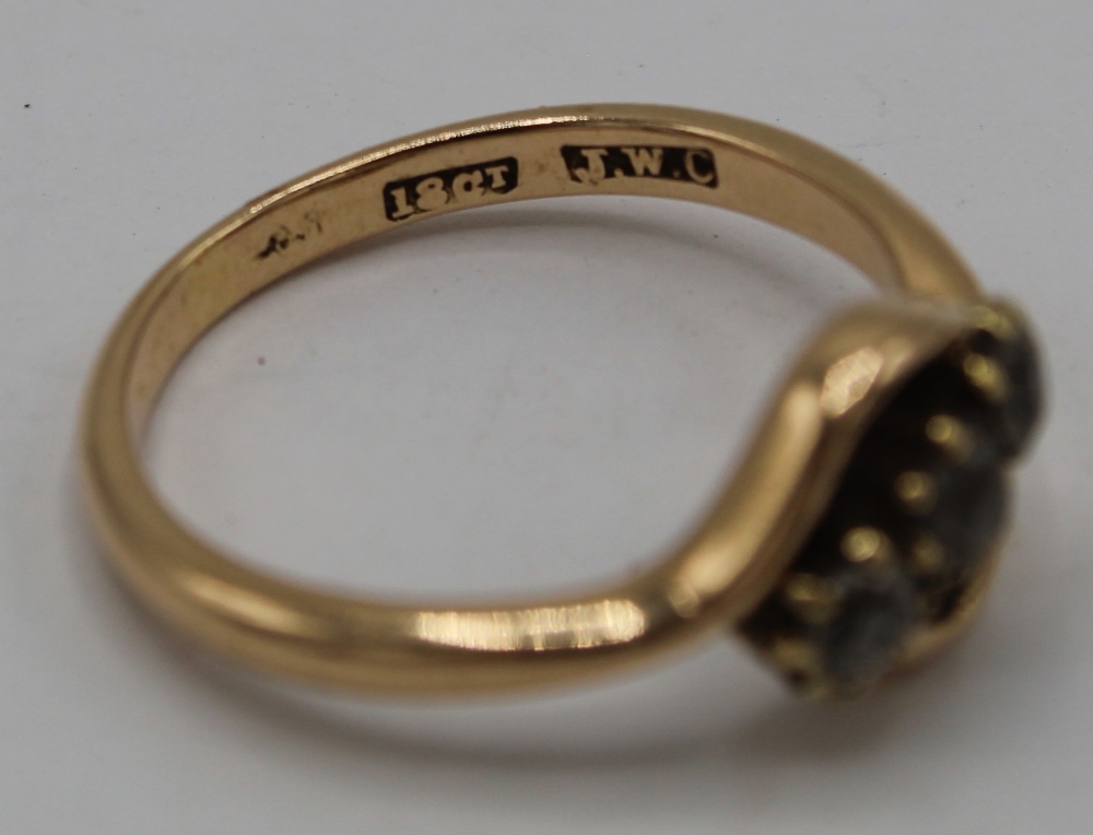 18ct gold ring, crossover set with three diamonds, stamped 18ct, size P, gross3.5g - Image 2 of 2