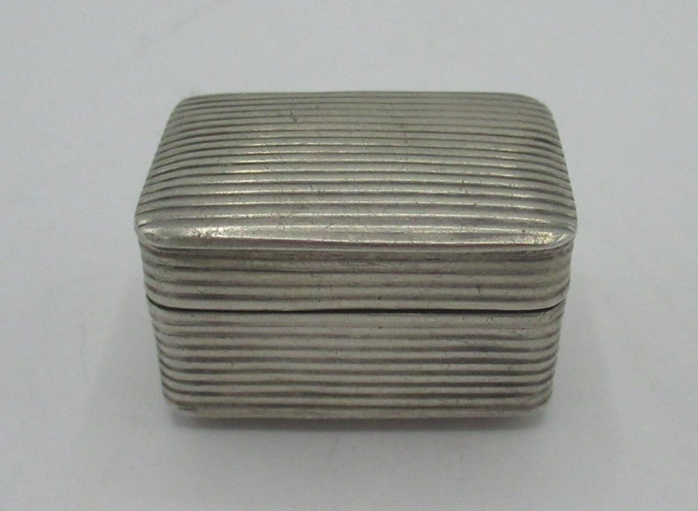 Early C19th hallmarked silver nutmeg grater, reeded body with hinged lid and rasp, possibly Joseph