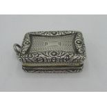 Will.IV hallmarked silver rectangular vinaigrette, engine turned with cast border, gilt interior and