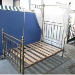 Edwardian brass half-tester bedstead, square railed head and foot with turned columns and finials,